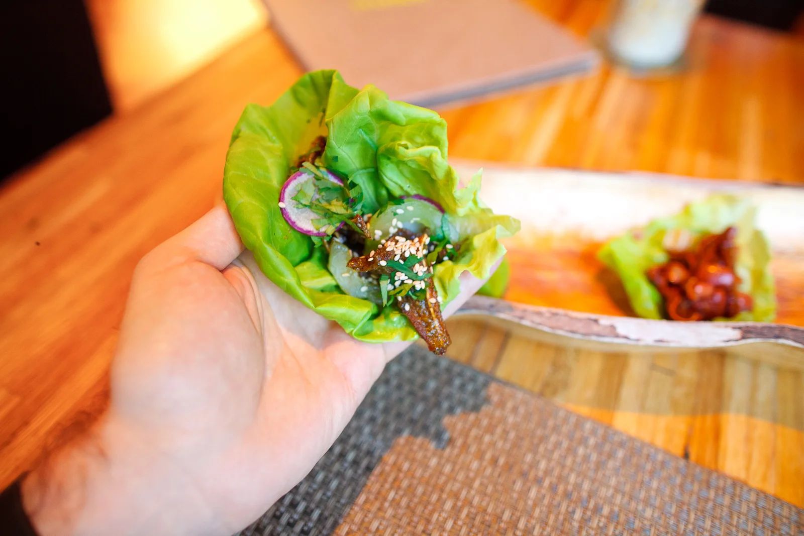 2nd Course: Crispy pig ears with cilantro, benne, and radish, wrapped in bibb lettuce