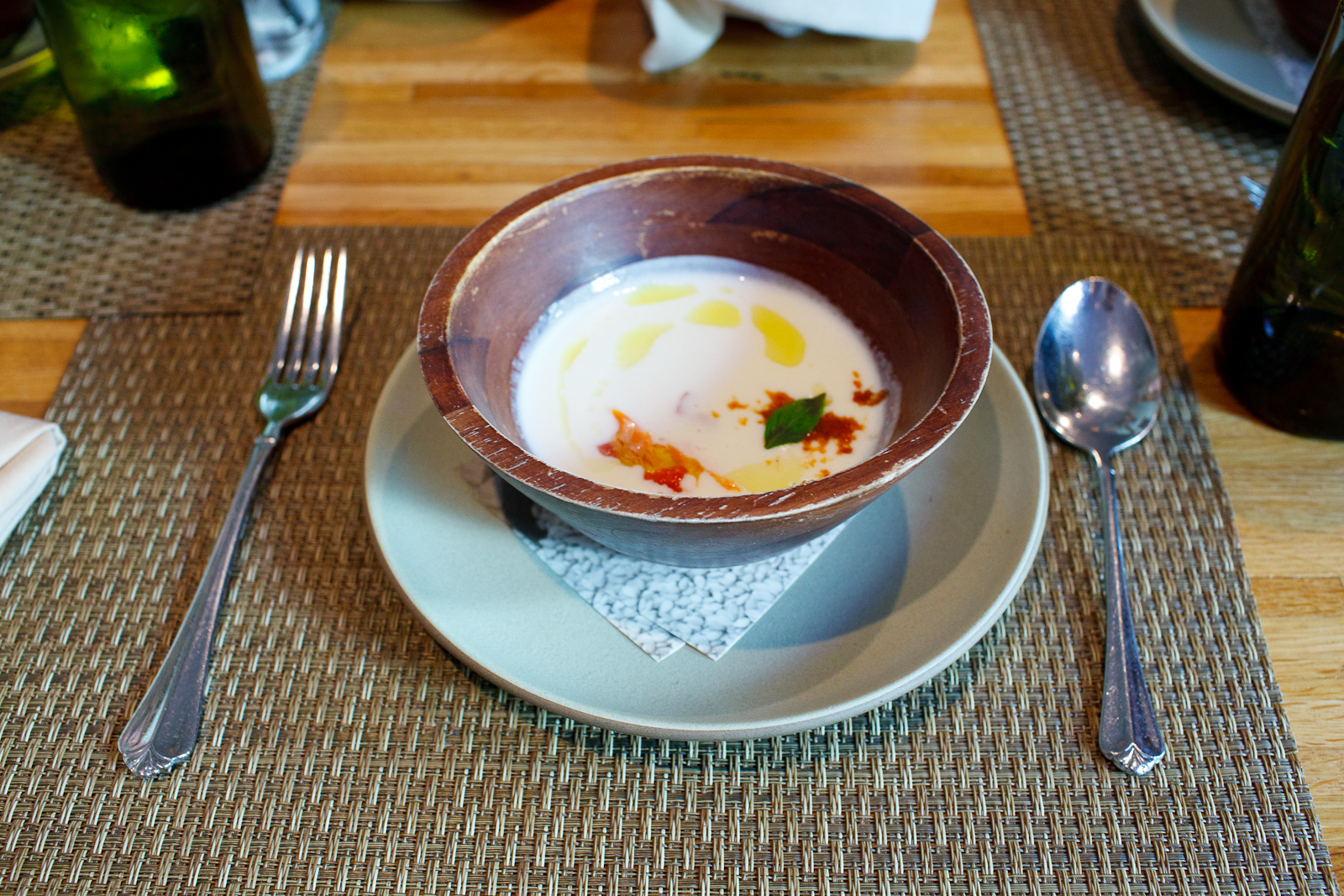 Palmetto Sweet Onion Bisque with Smoked NC Trout, Rye Croutons and TX Olive Oil