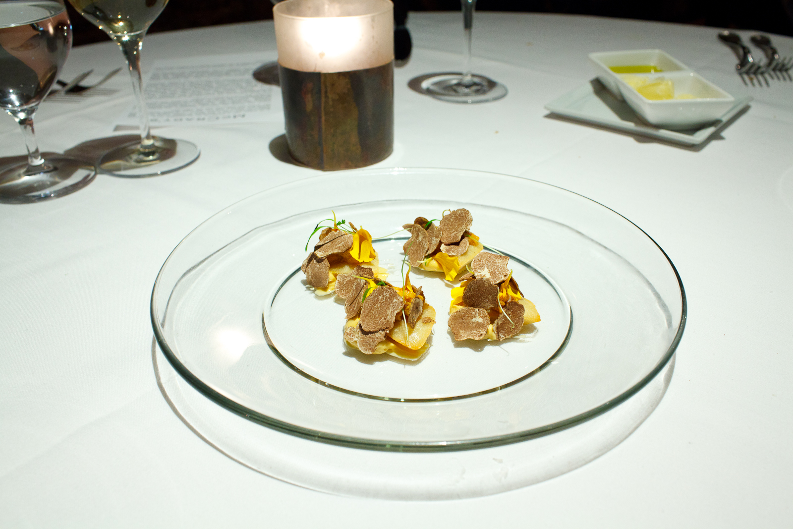 Amuse Bouche 4: Charleston take on a classic English tea cake, fat back financier, sea urchin butter, sea urchin tongue, topped with white truffle