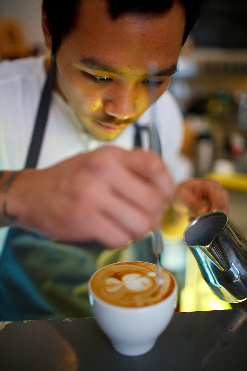 Charl making a fish on a cappuccino