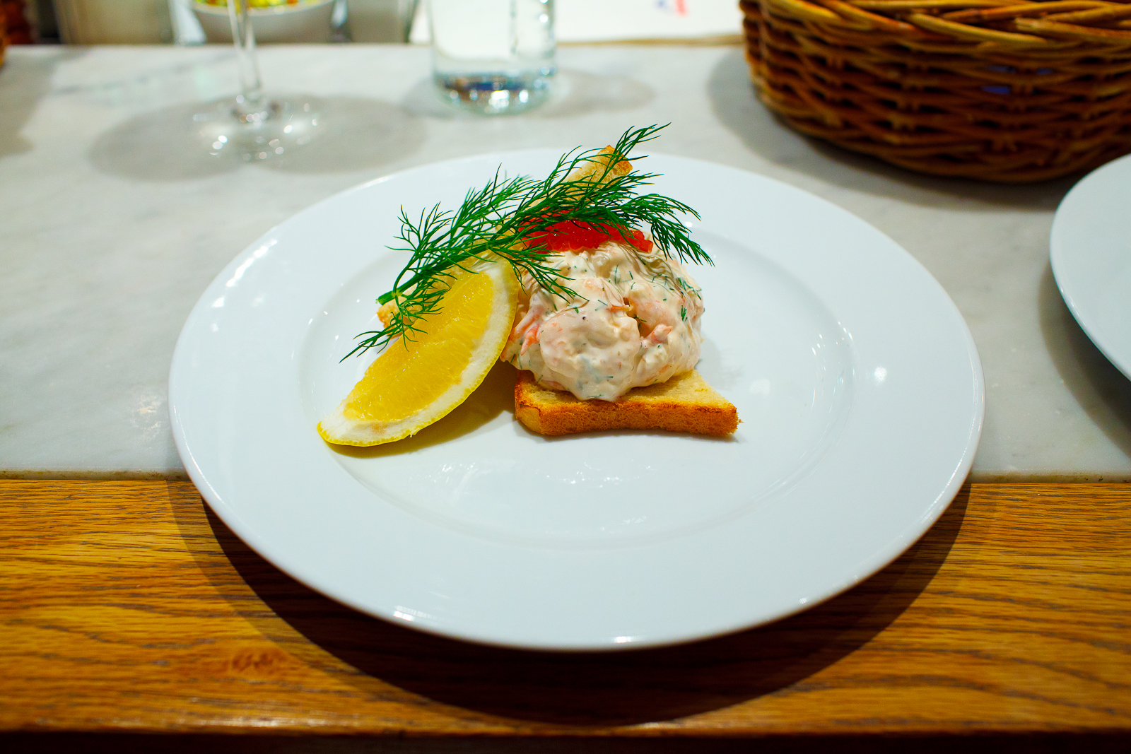 Toast skagen, 100g - Mixed shrimps, dill and mayonnaise served on toast, garnished with trout roe (135 kr).jpg