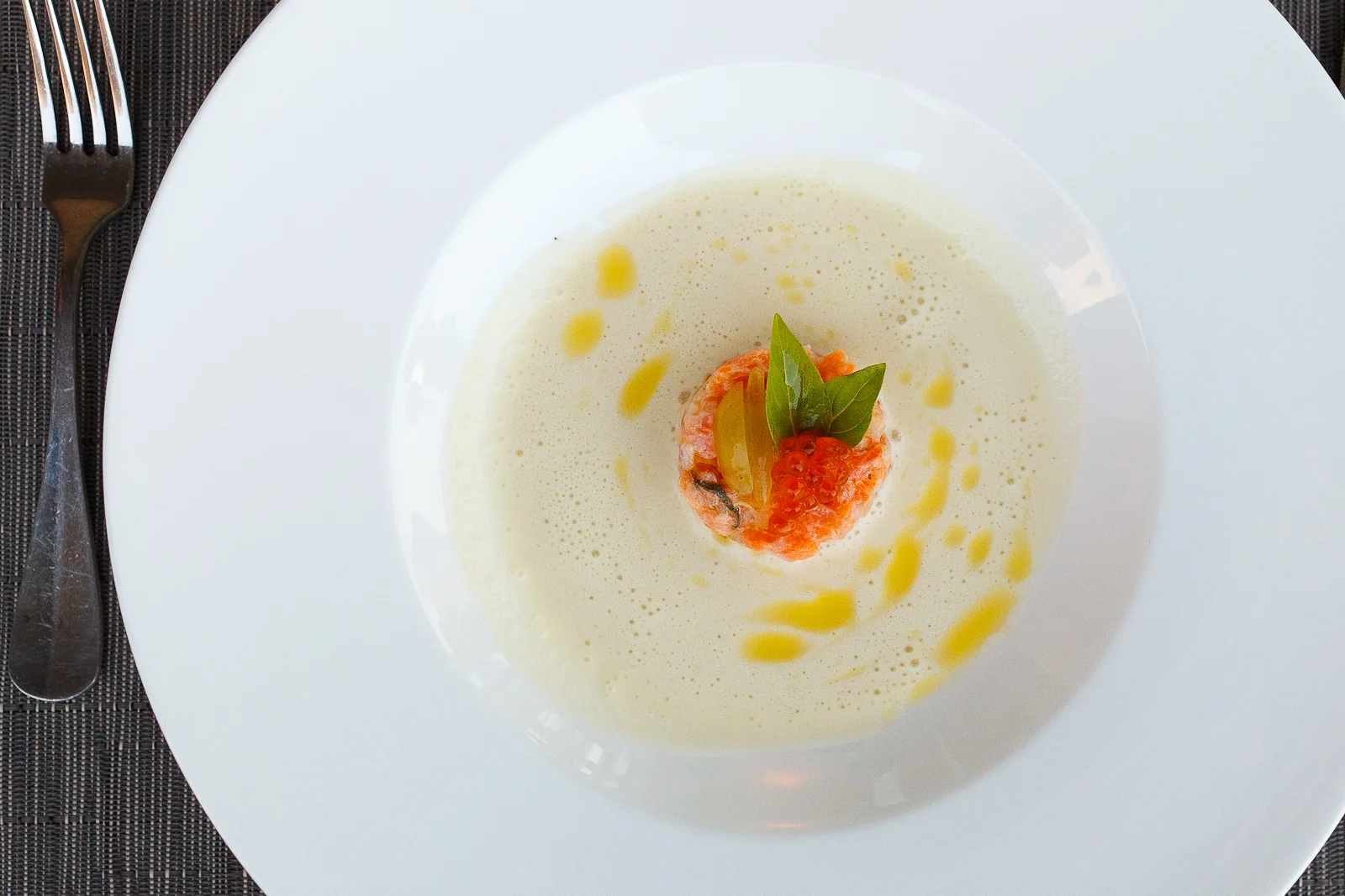 Salmon tartare, white gazpacho, yuzu, cucumber, Thai basil, salmon roe ($14)