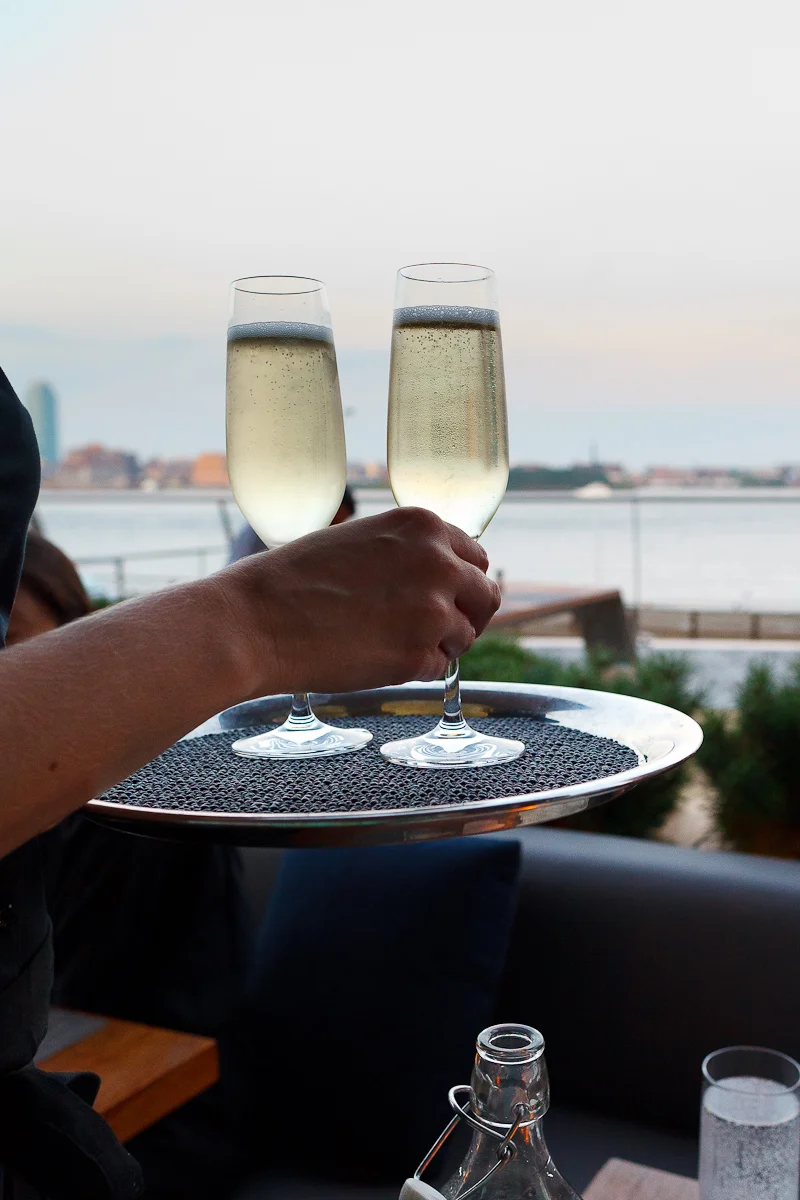 Two glasses of prosecco, with a view