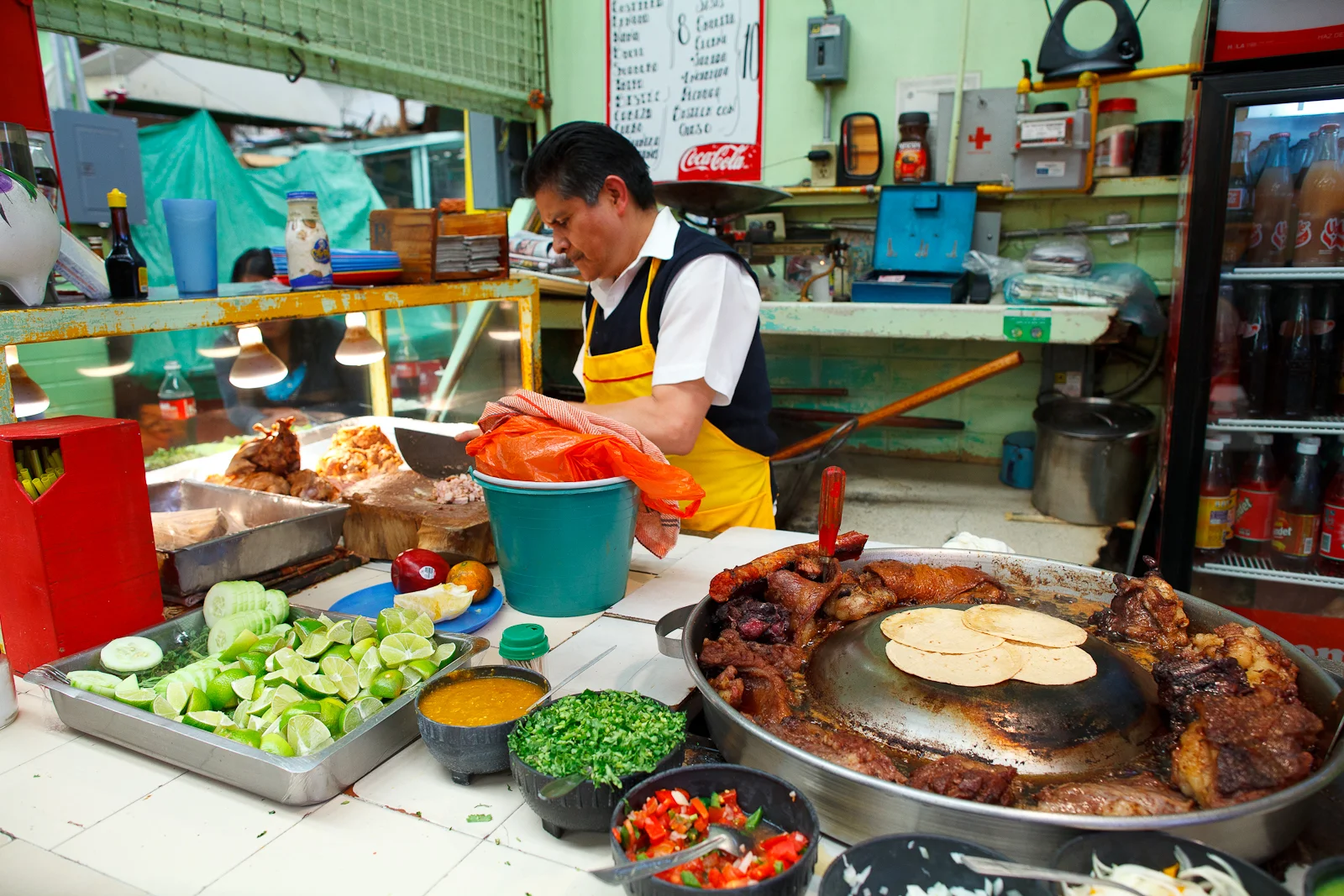 Chopping pork for carnitas