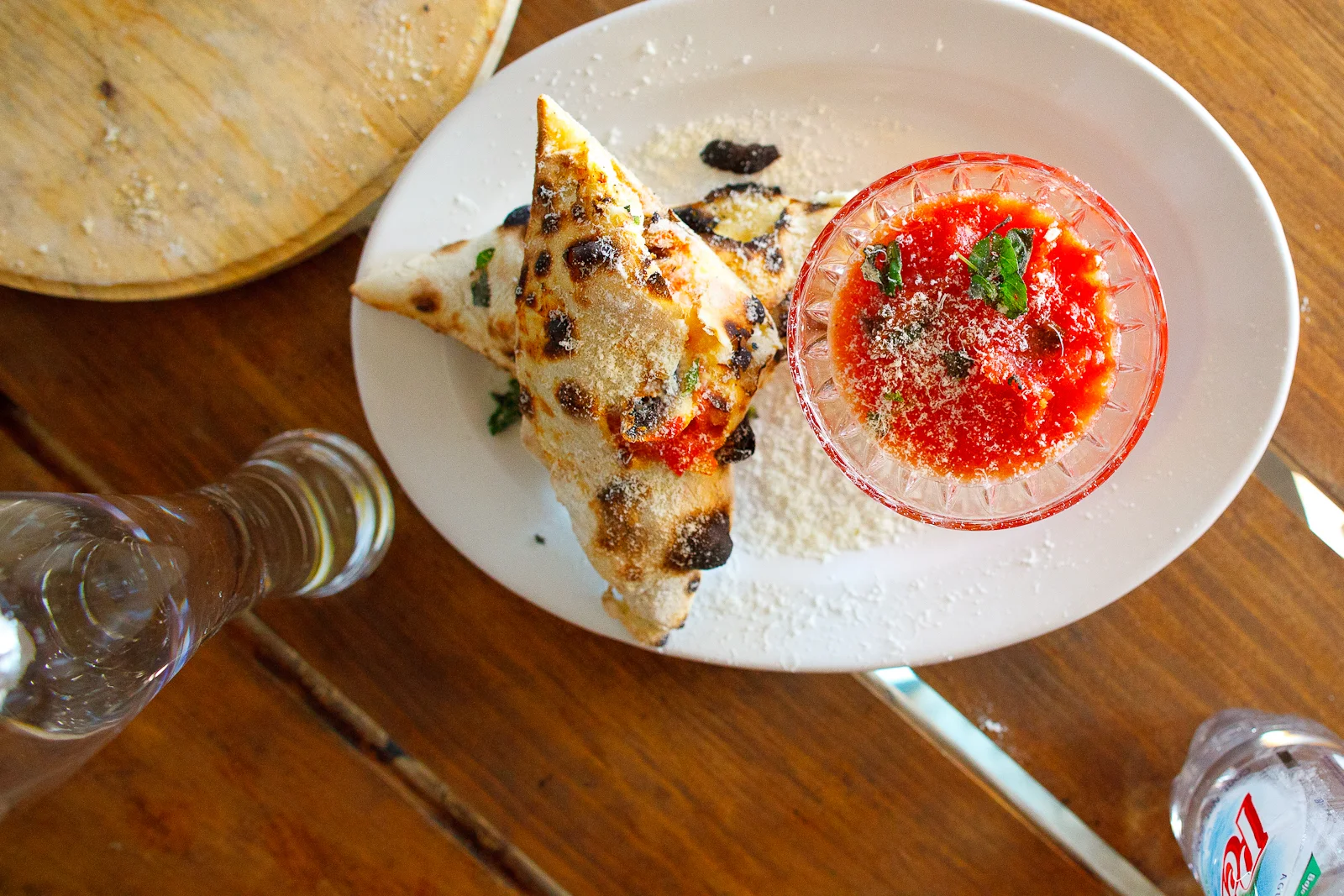 Calzone margherita with ricotta, mozzarella, and mushroom (55 MXP)
