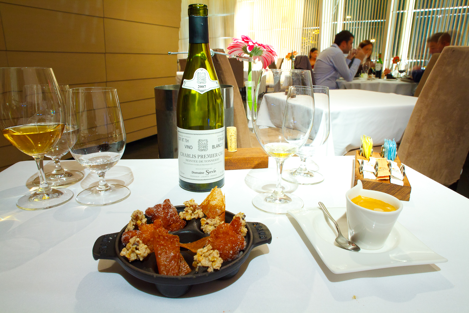 Petits fours: buñuelos, sunflower seed granola, and tuiles