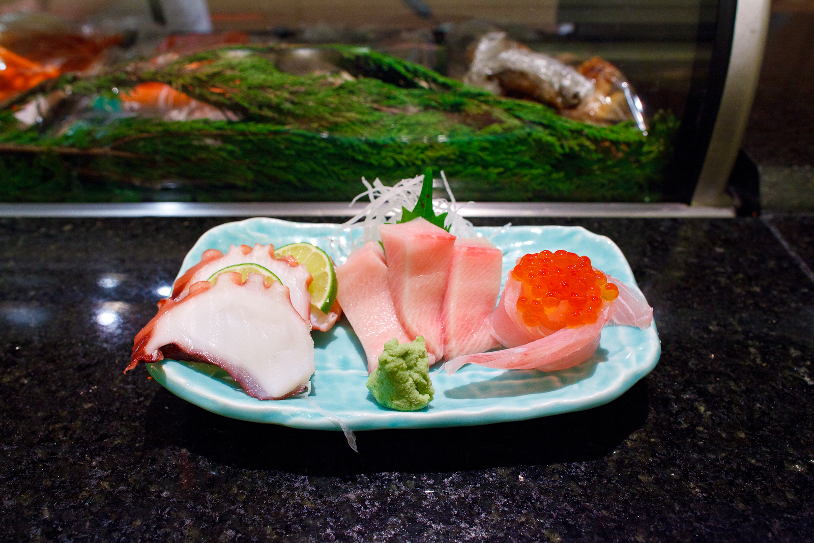 Octopus, yellowtail, and red snapper sashimi with salmon roe