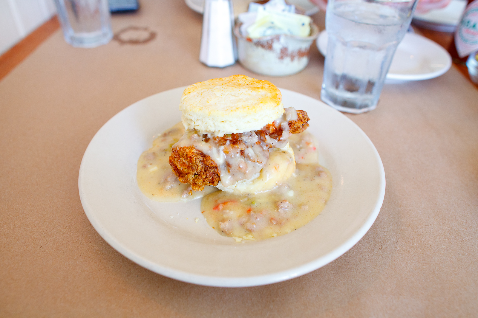 Big nasty biscuit with fried chicken breast, cheddar cheese, and sausage gravy ($6.50)