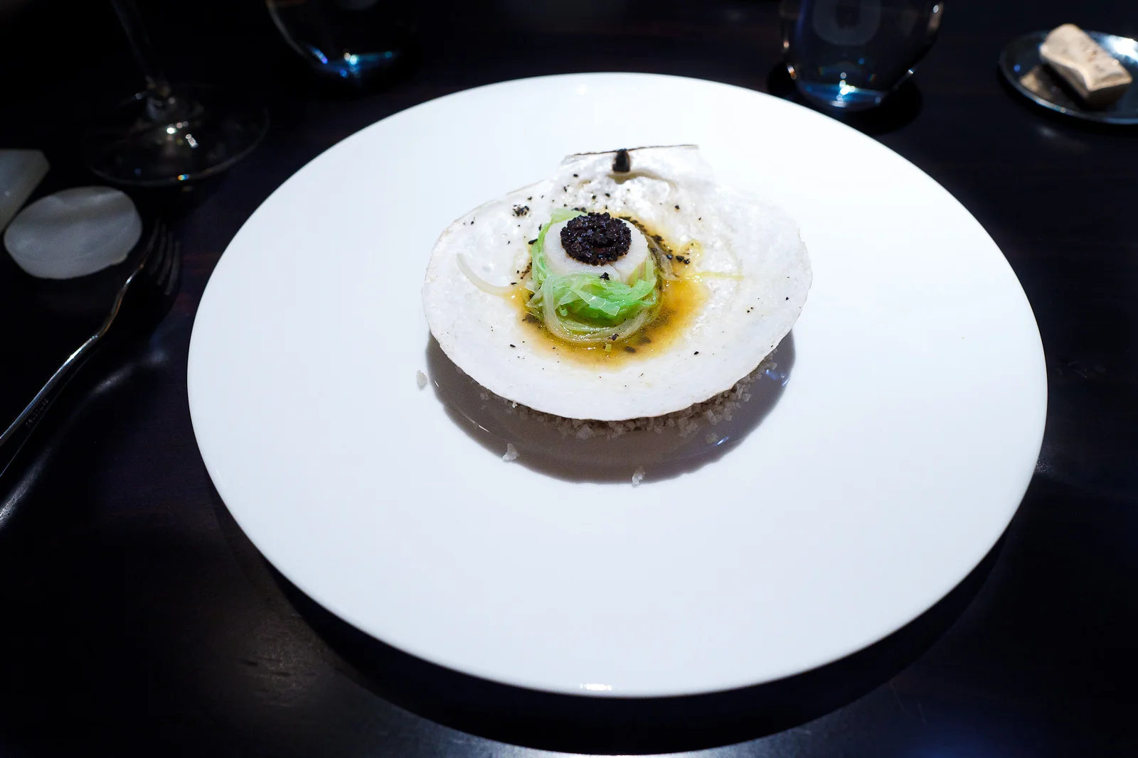 2nd Course: Hand harvested Maine scallop cooked in the shell, leeks, black truffle