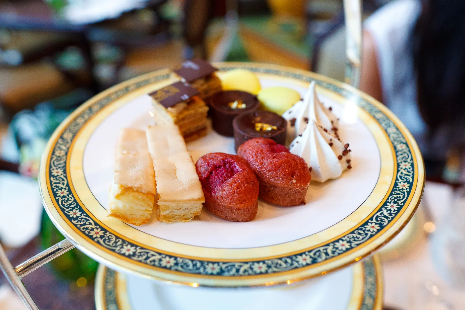 Earl grey meringue, "le russe" pralin, golden chocolate tart, raspberry financier, allumette "royale," lemon macaron