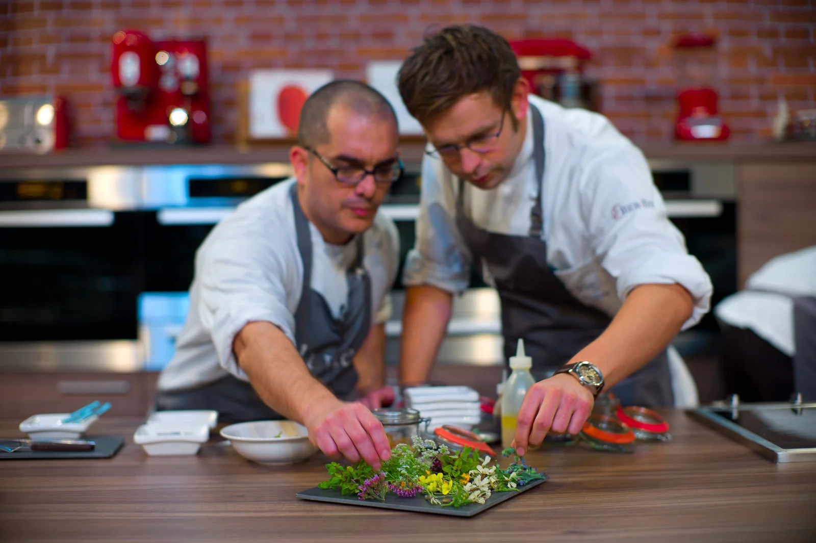 Team at La Vie, plating foraged herbs