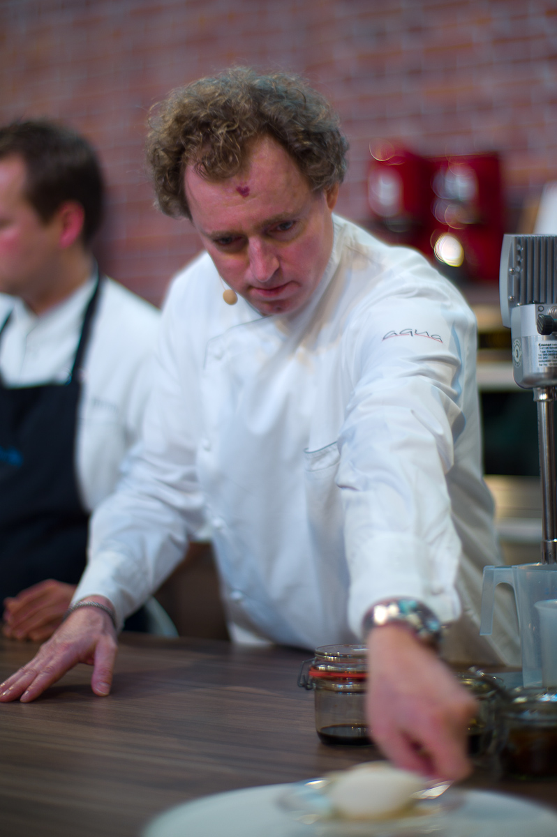 Chef Sven Elverfeld plating his Handkäse