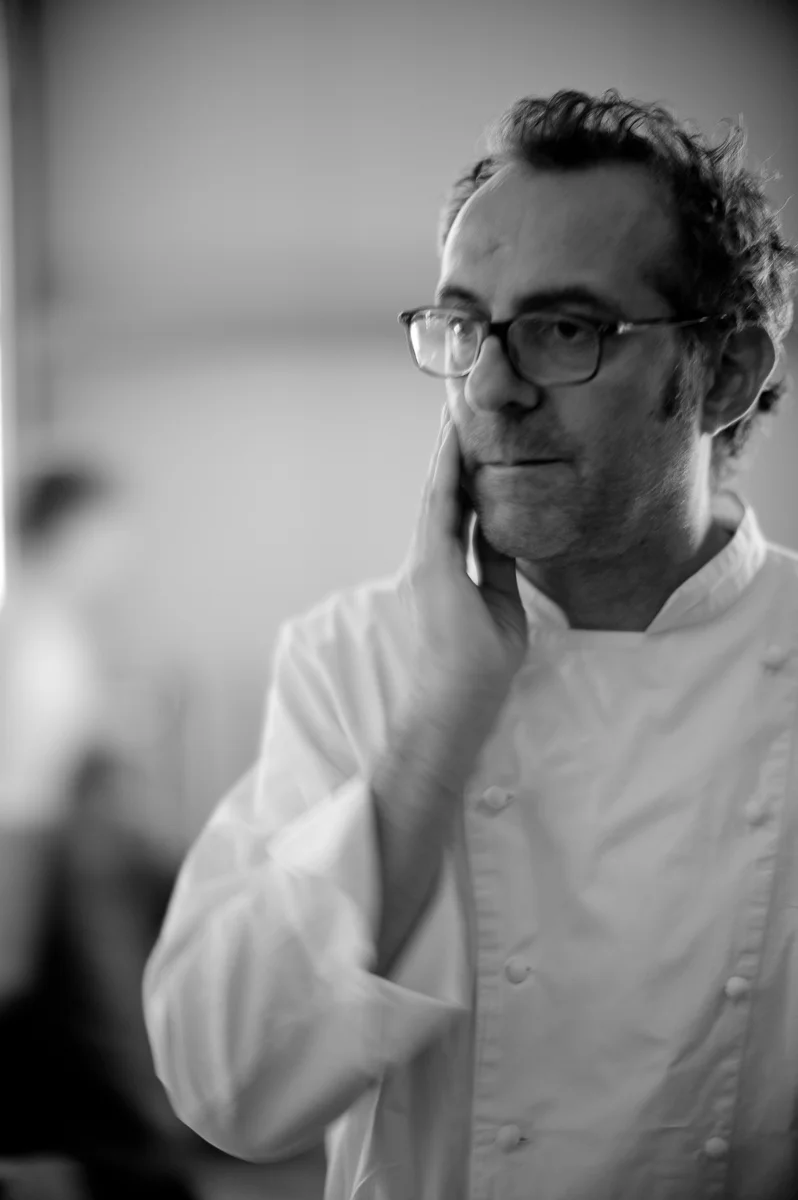Portrait of Massimo Bottura. "As a chef, if you have to ask how much it costs, don't buy it."
