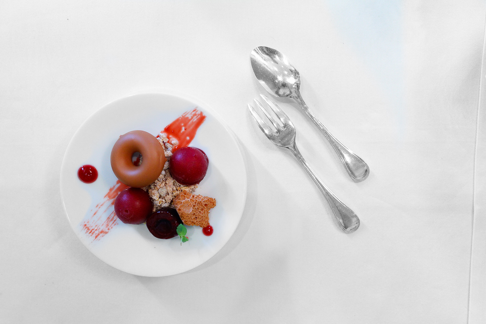 5th Course: Tanariva lactée, airy - liquid - solid, marinated cherries, caramelized quinoa