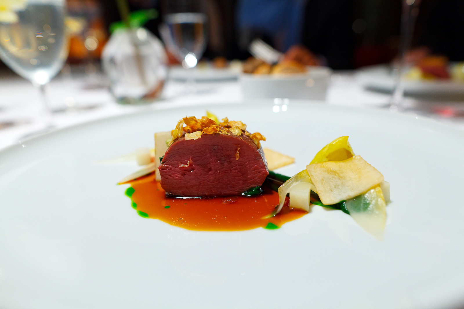 10th Course: Red deer calf from the Altmark region, parsley, vineyard peach and chicory, interior
