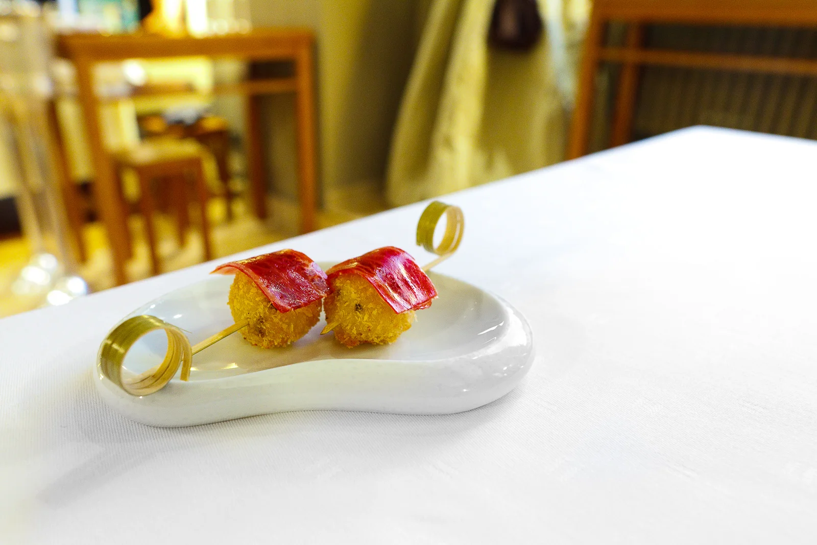Amuse Bouche 3: Risotto with taggiasca-olive and bellota "puro"