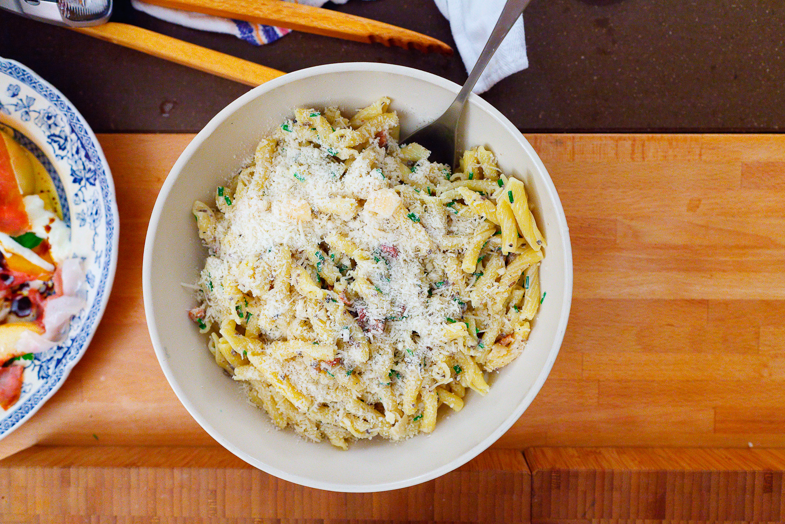 Casarecce with Parmigiano-Reggiano, black summer truffle, smoked pancetta