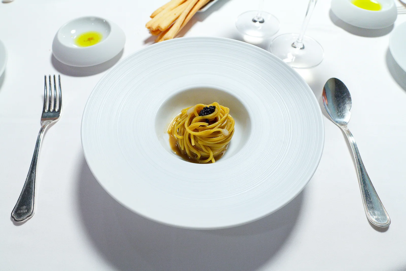 4th Course: Guitar string pasta cooked in burnt calamari broth, finished with Fines de Claires oyster purée and extra virgin olive oil