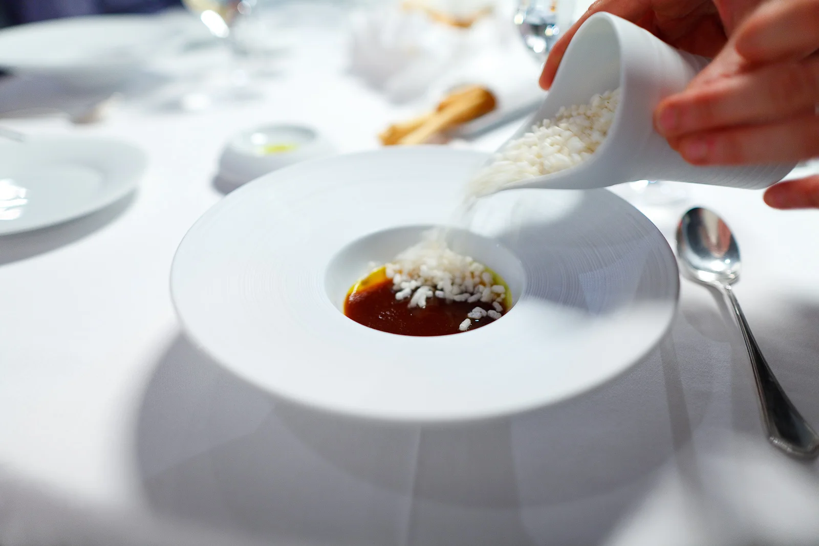 8th Course: Intense concentration of Ossobucco "Milanese style," saffron oil, crispy rice