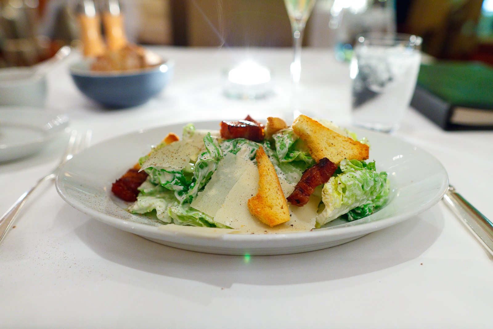 Iceberg lettuce, bacon, parmesan cheese, croutons