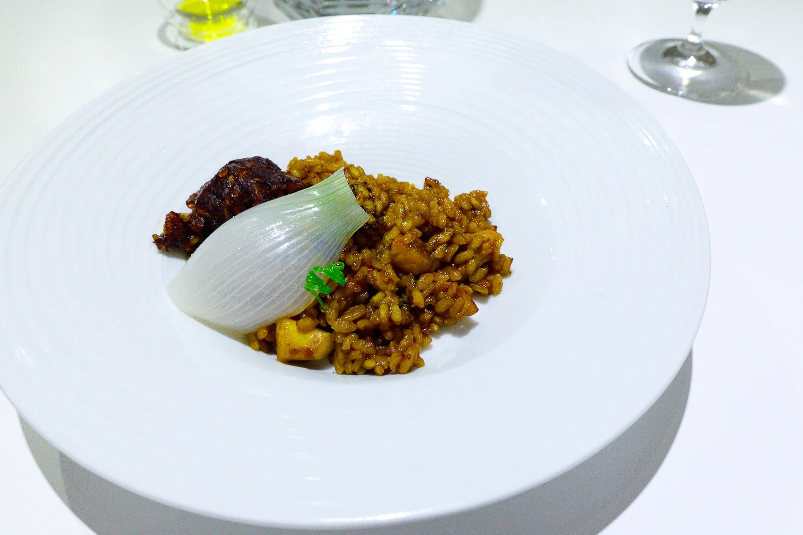 6th Course: Arroz con mariscos, octopus, squid, wreckfish, and saffron