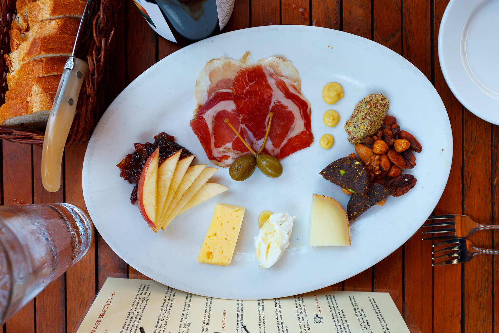 The works - Abbaye de Belloc, Laura Chenel Chèvre, and Joe Mates St. George cheese with cured meats, seasonal fruit, house-made fig cake & baguette.