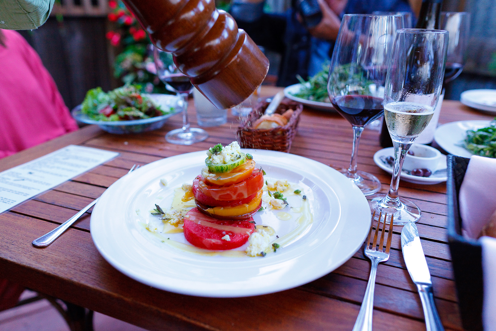 Heirloom tomato & watermelon salad, marinated feta, yellow tomato vinaigrette ($12)