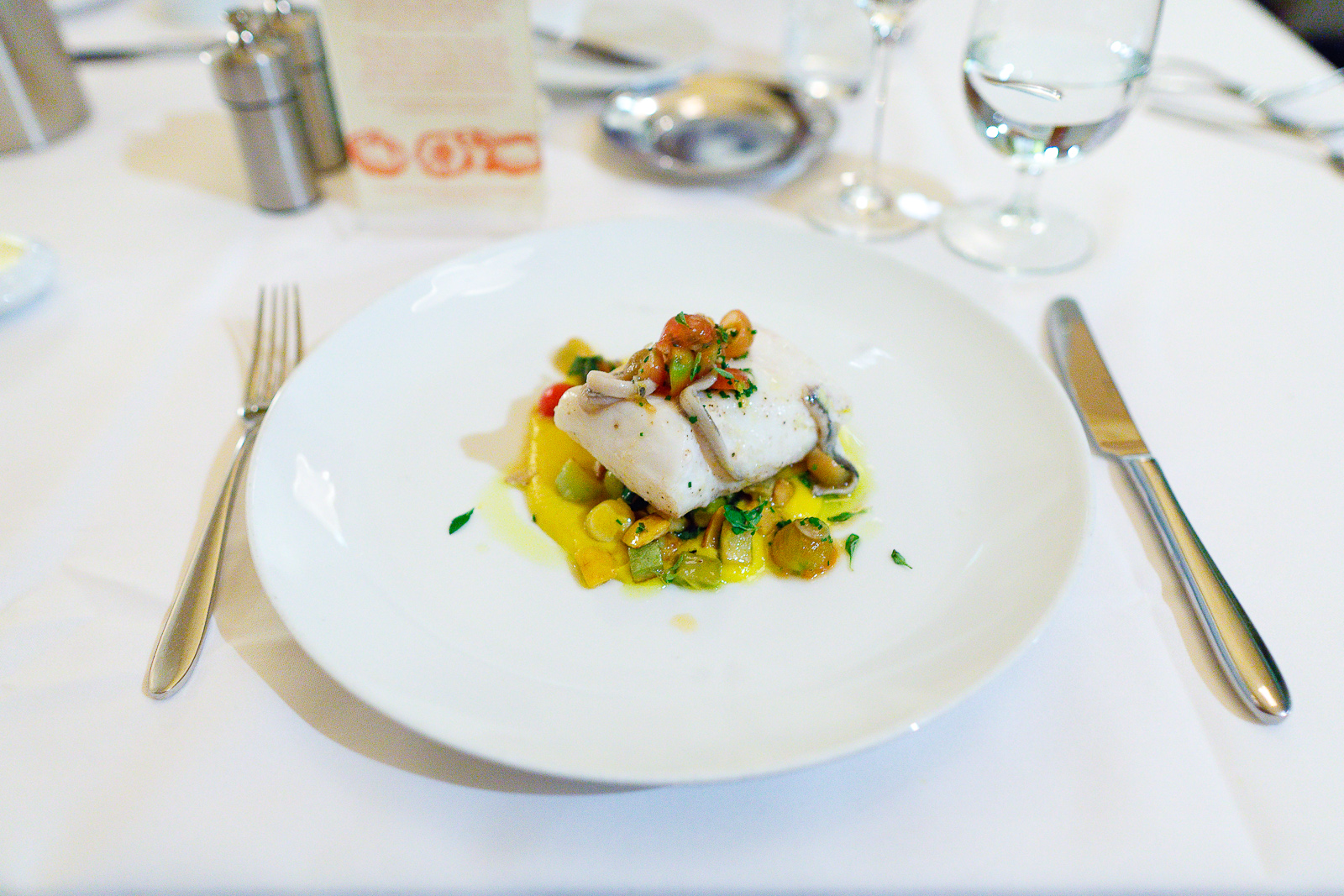 Alaskan Halibut "Sous Vide" summer squash, sweet 100s, house-cured boquerones ($29.50)