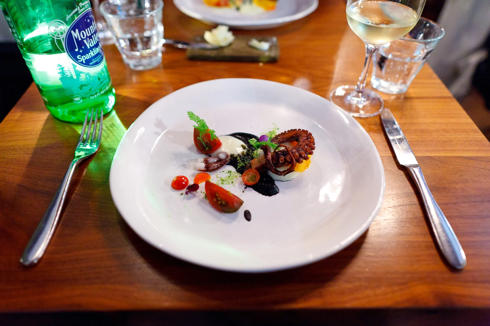 Octopus, smoked tomato, clam, olive