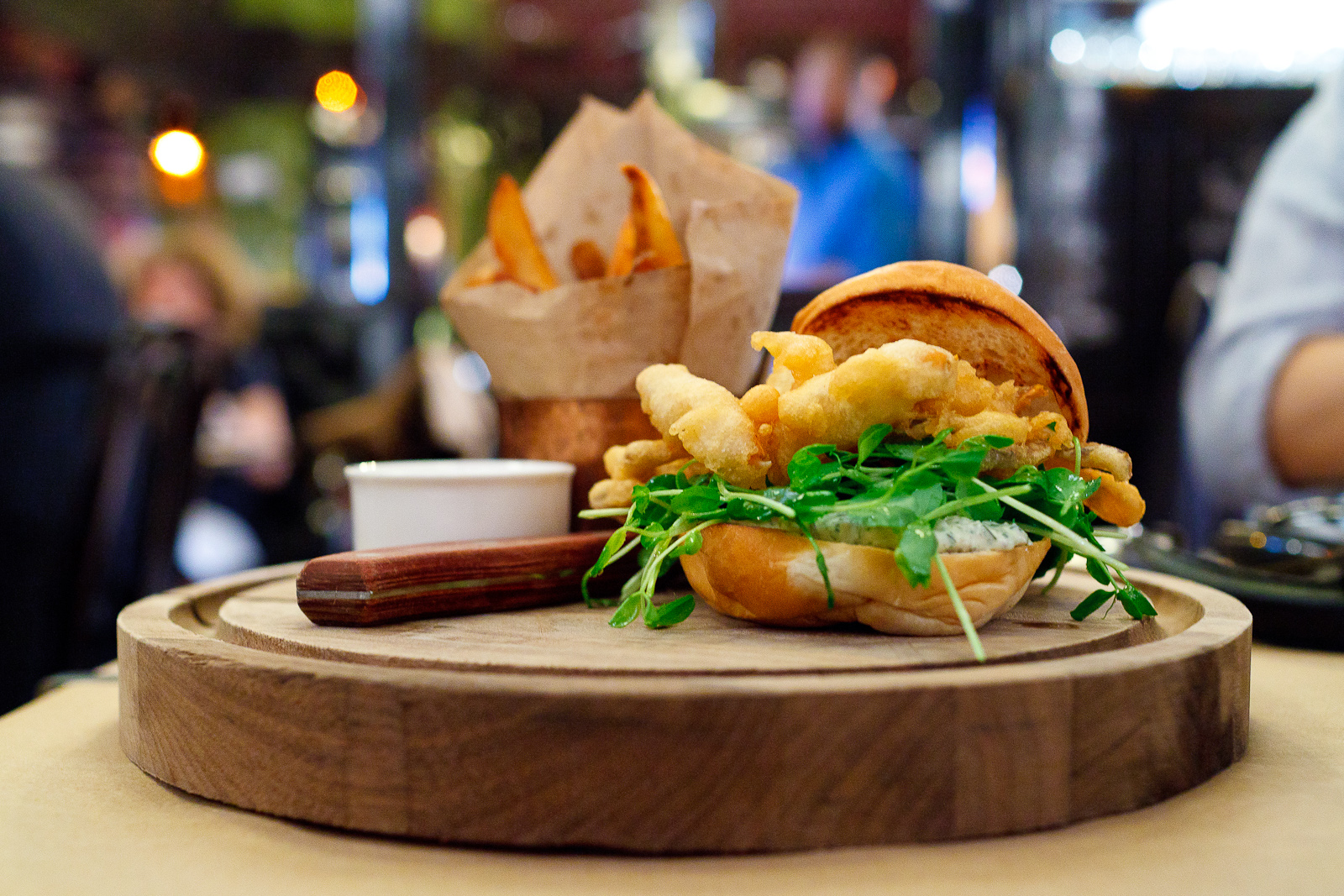 Softshell crab sandwich with ramp tartar sauce and pea shoots ($24)