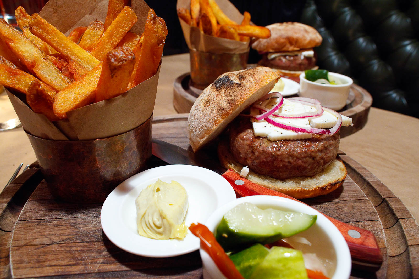 Chargrilled lamb burger with feta, cumin mayo, and thrice cooked chips ($21)