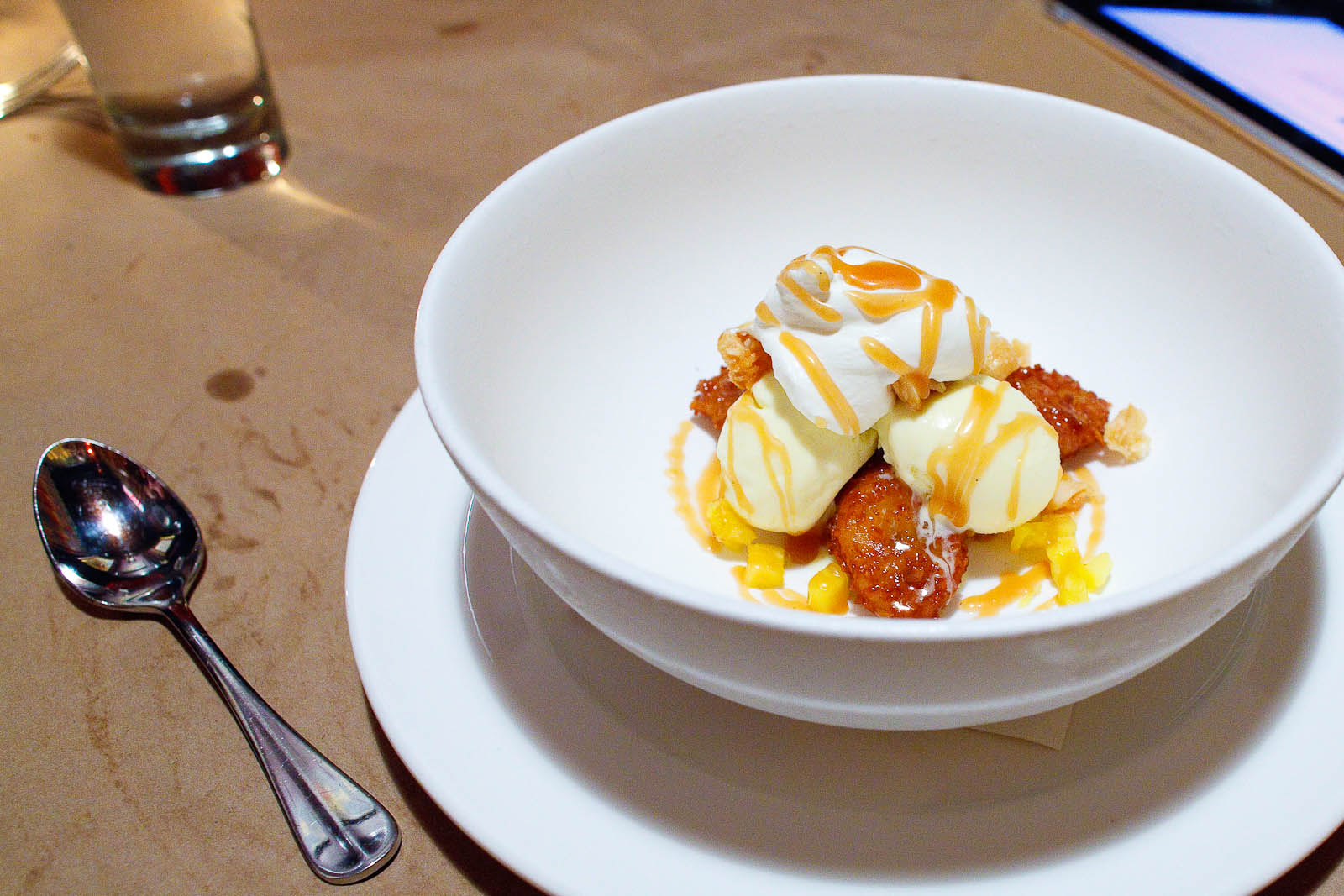 Caribbean sundae - coconut ice cream, fried banana, gosling's caramel, macadamia ($9)