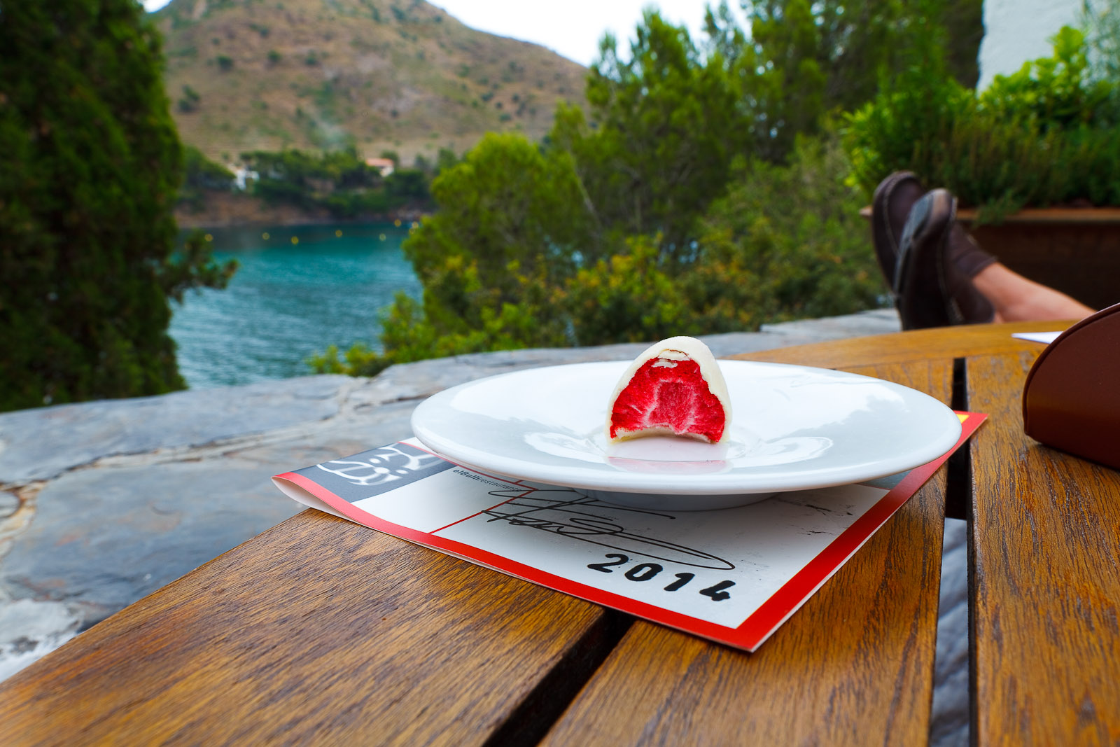 White chocolate covered dehydrated strawberry. After the meal, chatting until sunset.