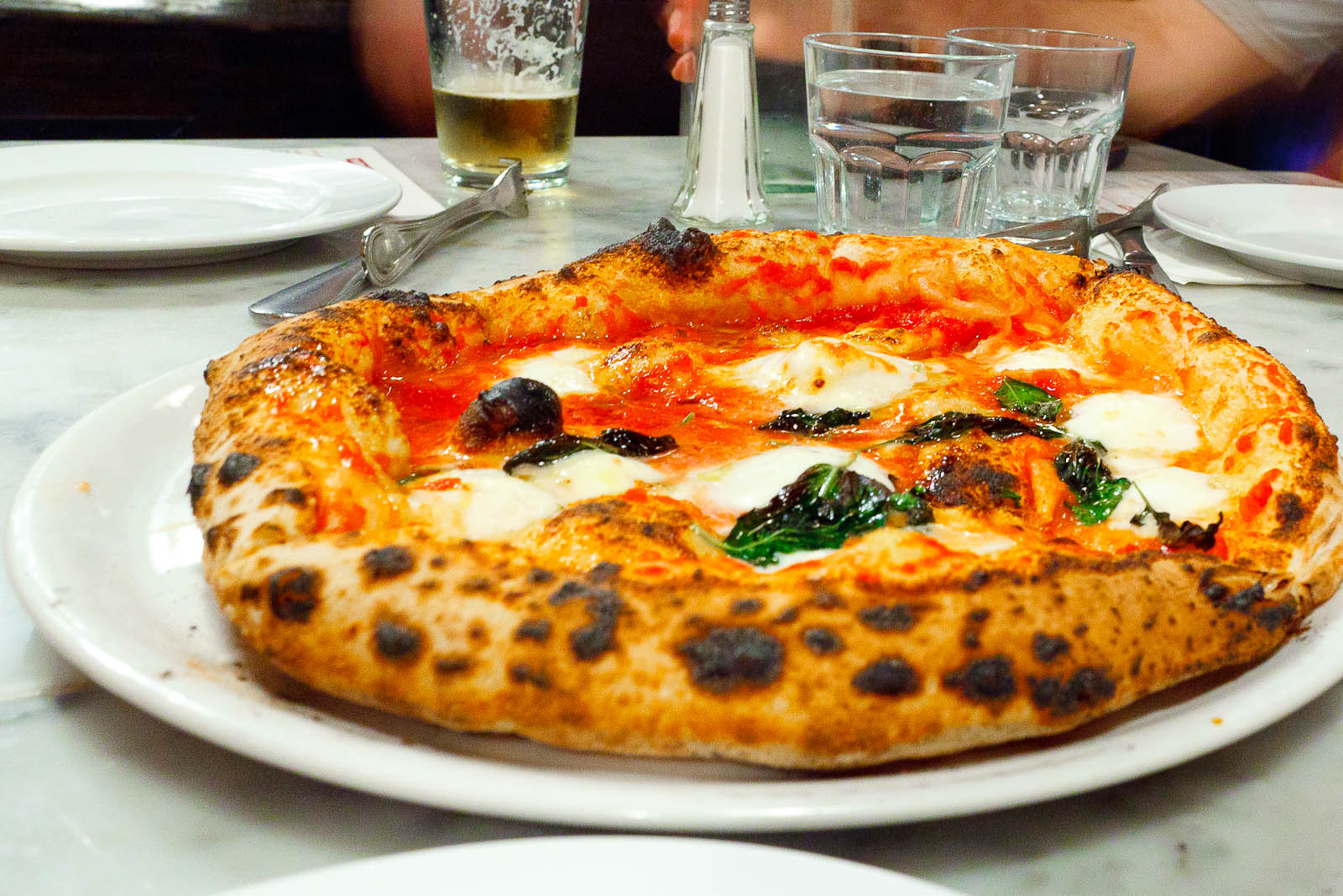 Pizza Margherita - tomato, mozzarella di bufala, basil ($13)