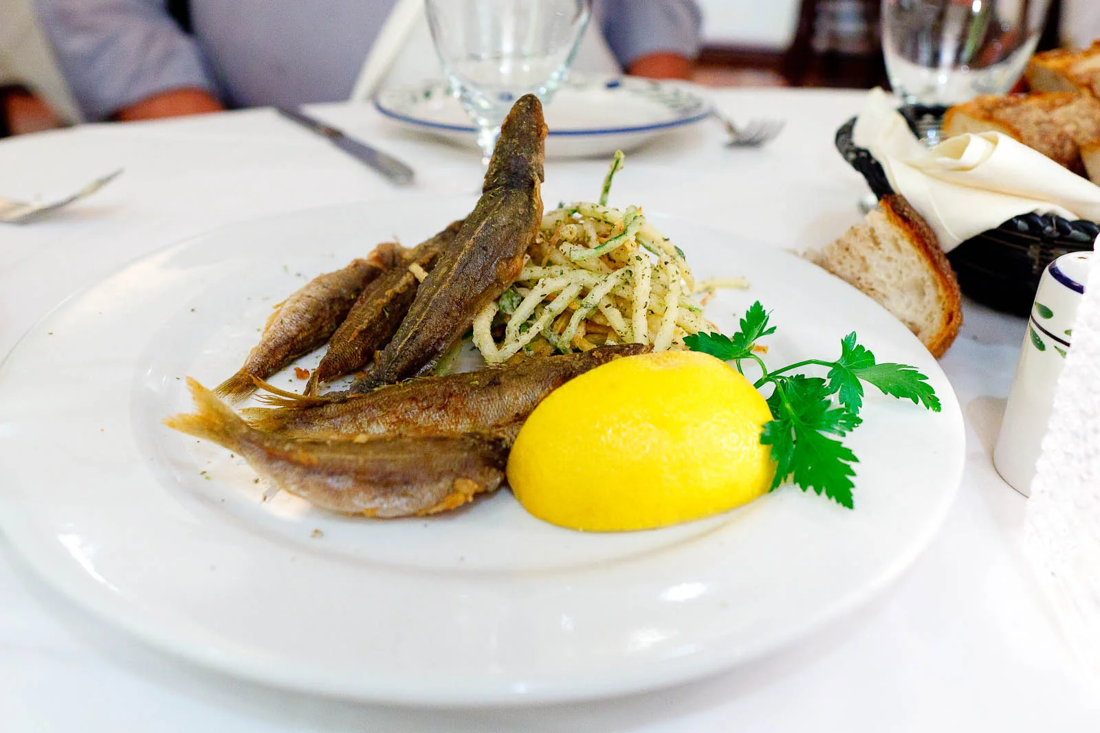 Breaded smelts fried in olive oil, eaten whole.