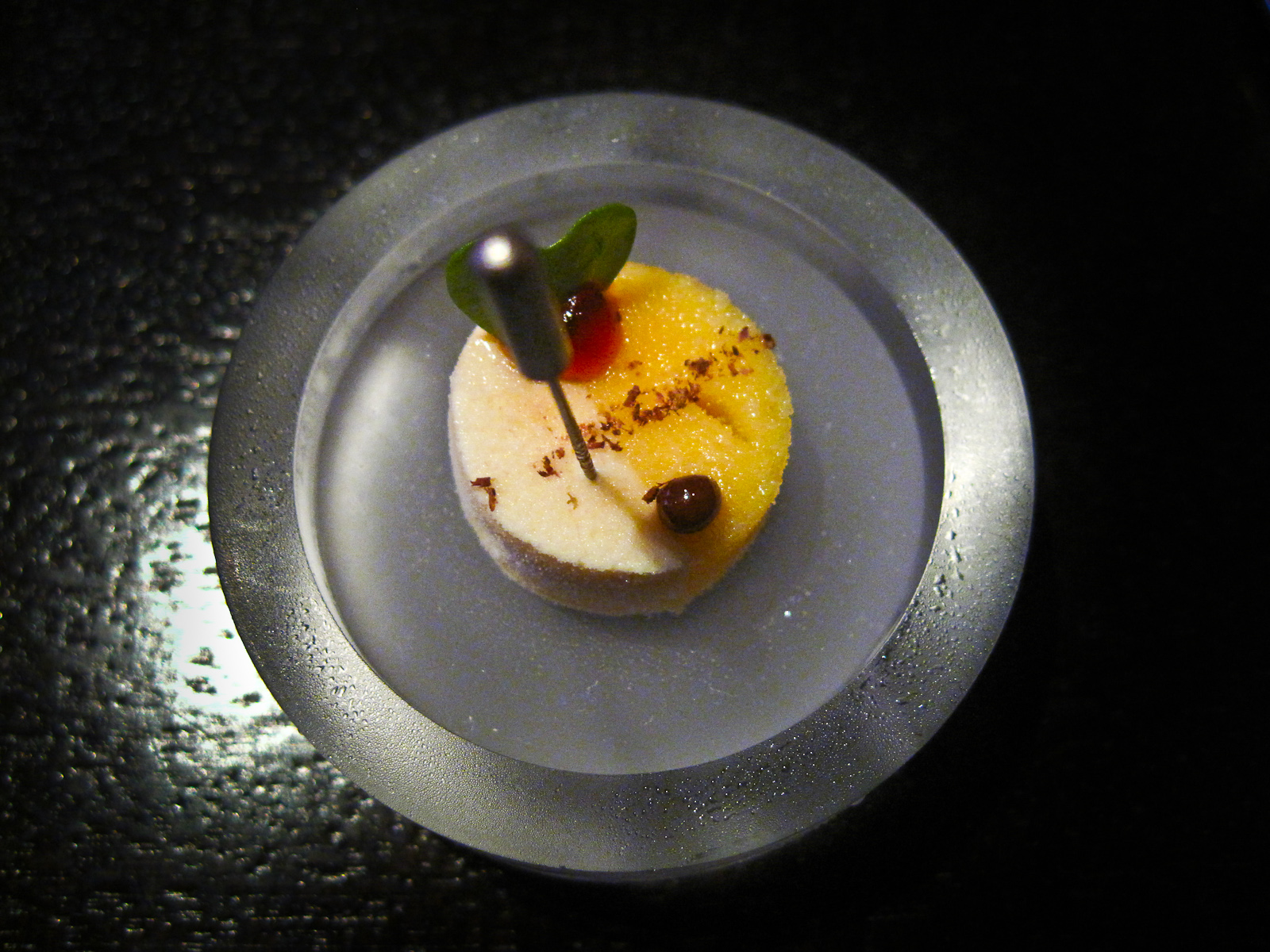 Intermezzo: frozen disc of mustard, passionfruit, and allspice.