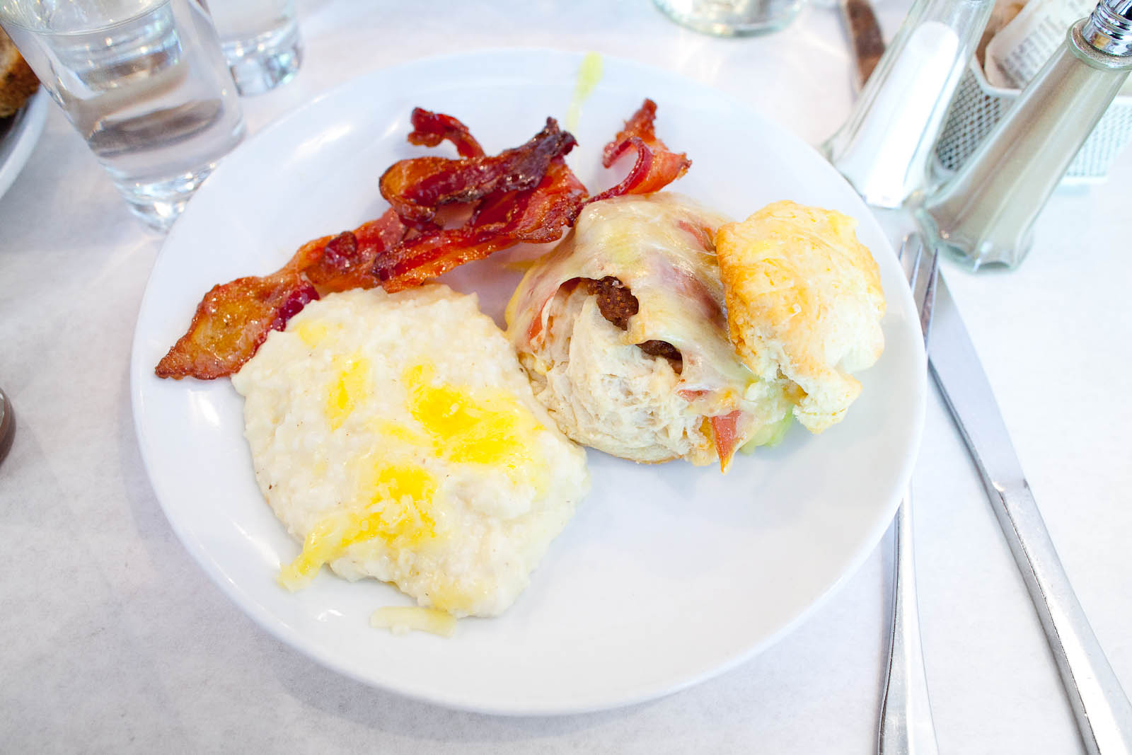 Country ham biscuit from Col. Bill Newsom's hams in Princeton, Kentucky served with homemade fig jam, Grafton cheddar, and cheesy gritz ($10.25)