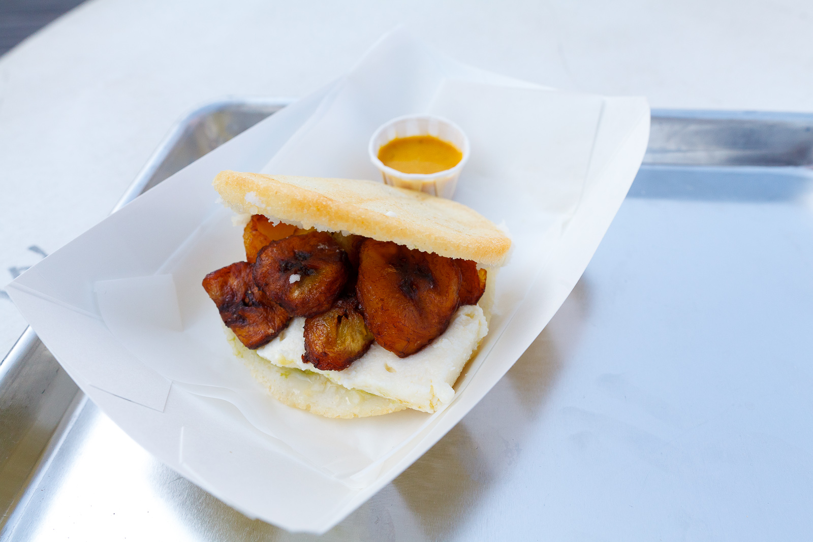 Arepa de pabellón: shredded beef, black beans, white salty cheese, and sweet plantains ($7.50)
