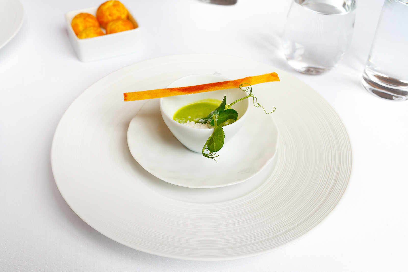 Canape: Chilled pea soup with ham chip