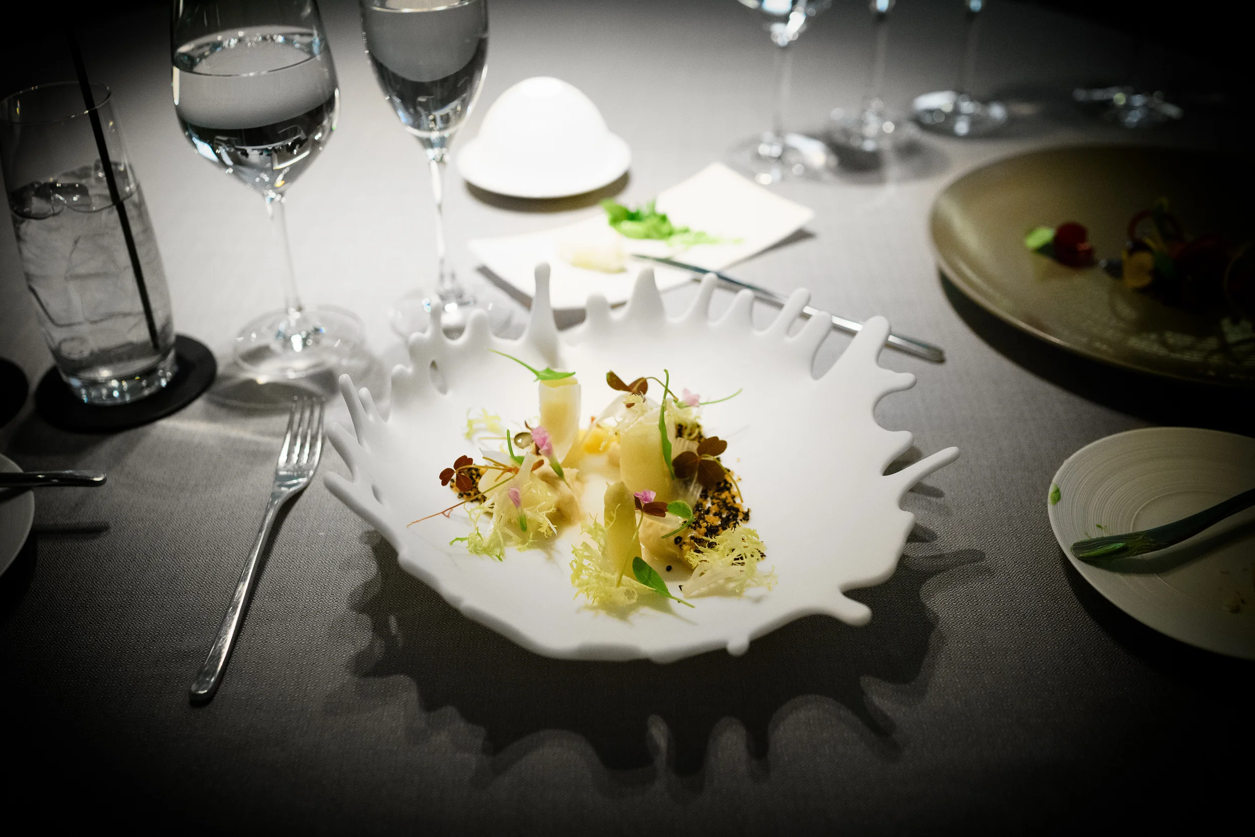 White asparagus, brioche, black olive, sorrel