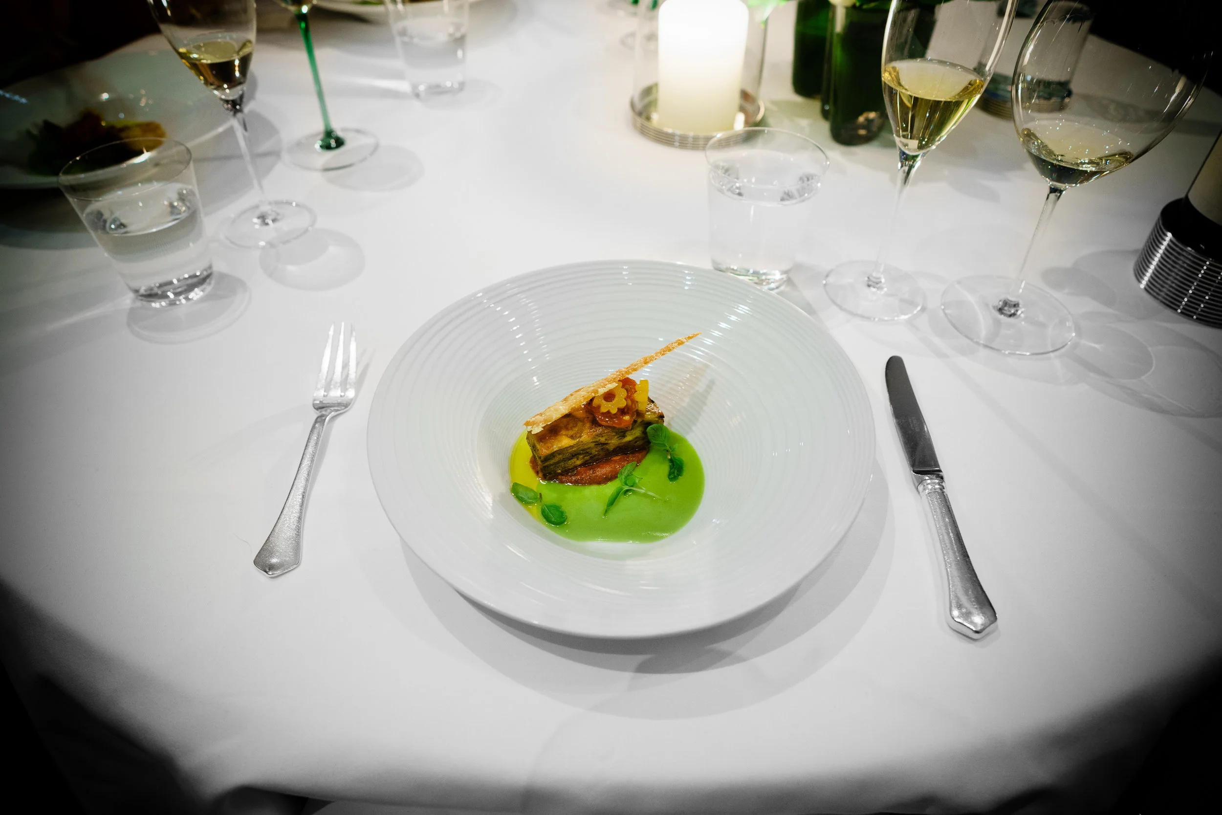 "Eggplant Parmigiana" - Tomato Conserva, Parmesan "Tuile," Pine Nuts, and Basil Leaf Emulsion