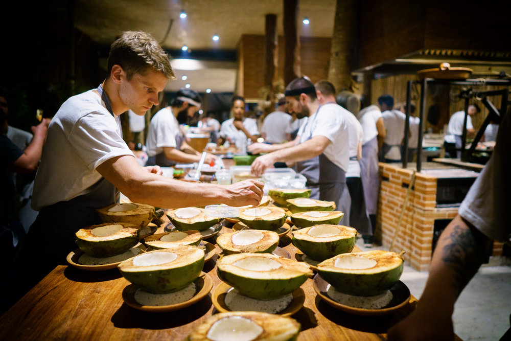 Prepping young coconuts