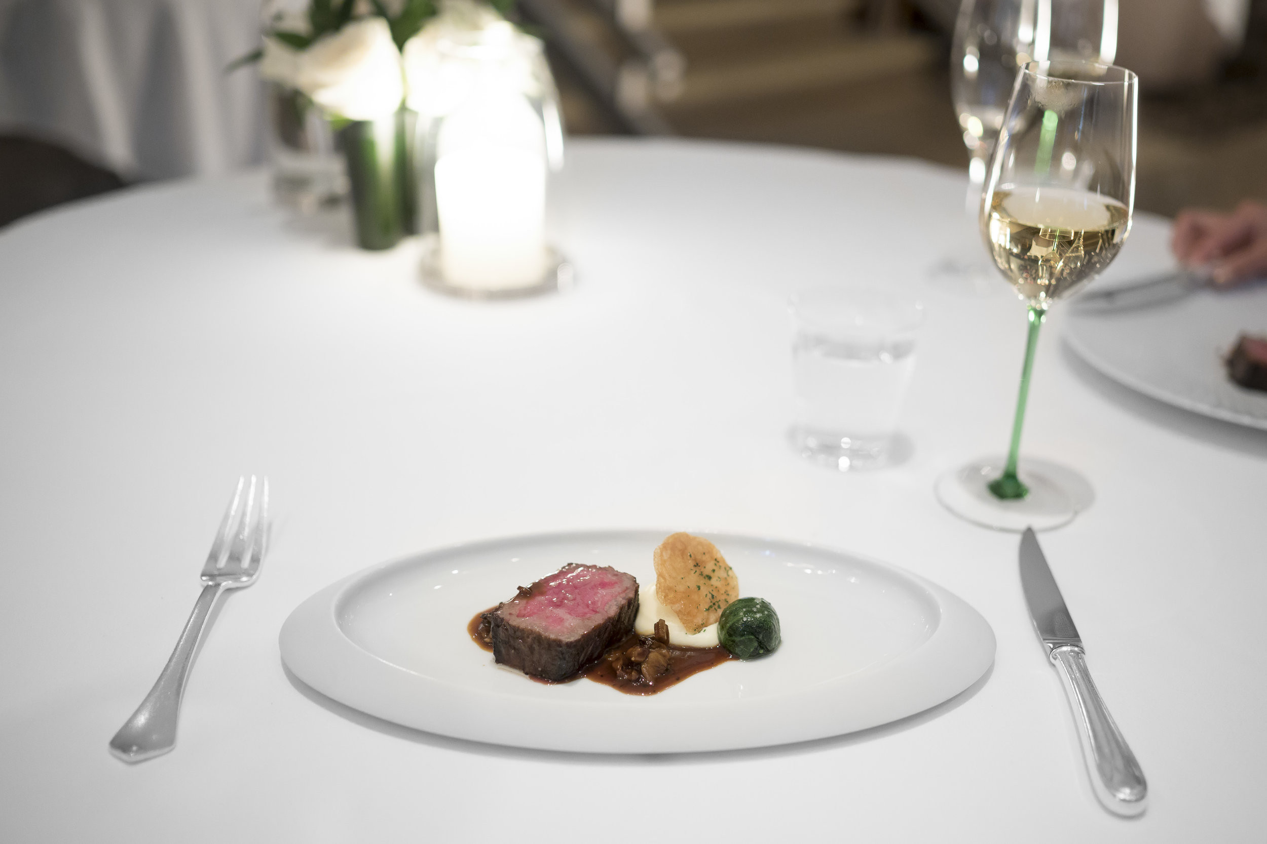 Charcoal-grilled Miyazaki Wagyu. "Ris de Veau," Wilted Spinach, "Pommes Maxim's," and Wild Mushroom-Madeira Cream.