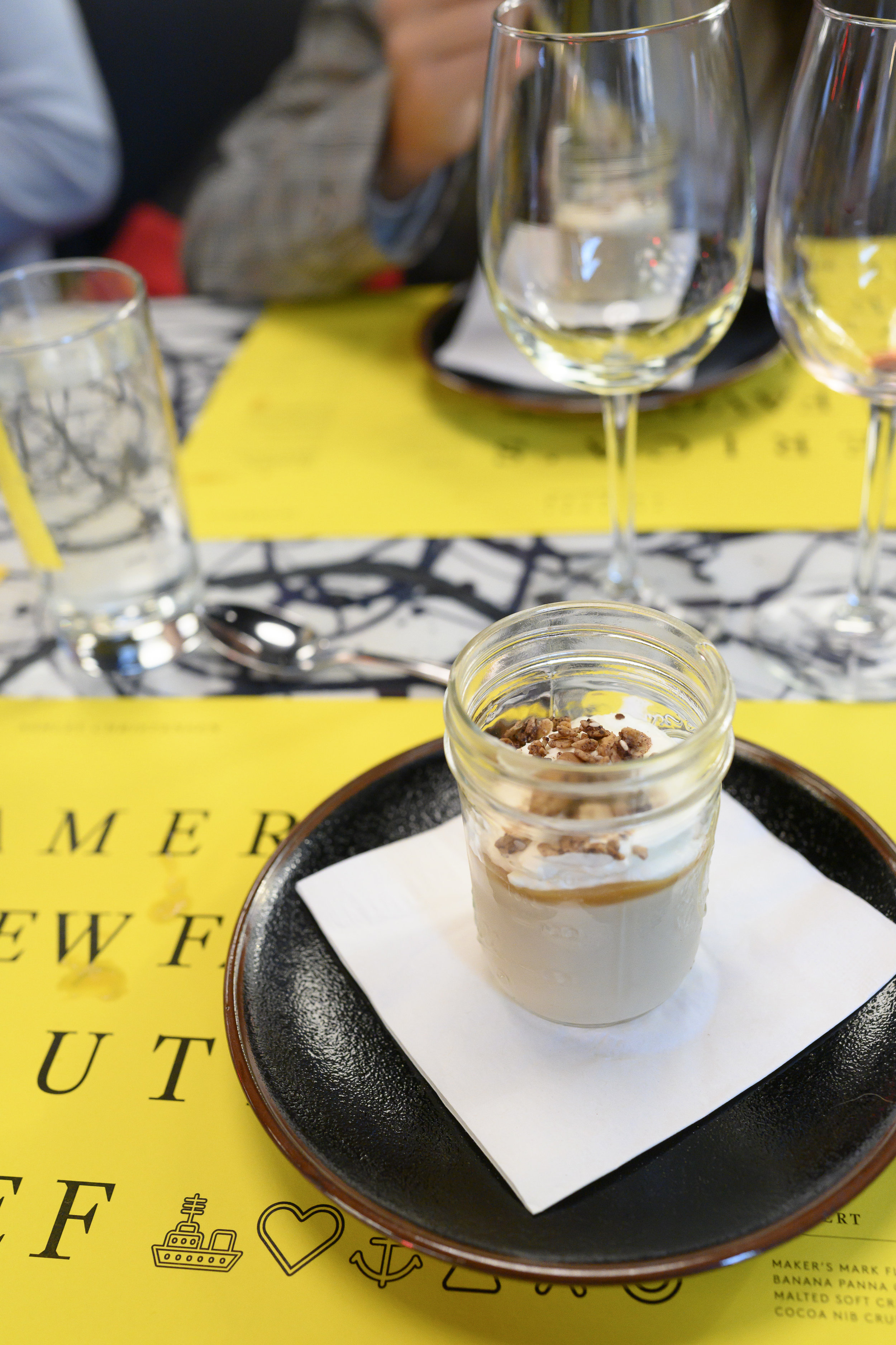 Maker's Mark Flambeed Banana Panna Cotta with Malted Soft Cream and Cocoa Nib Crunch