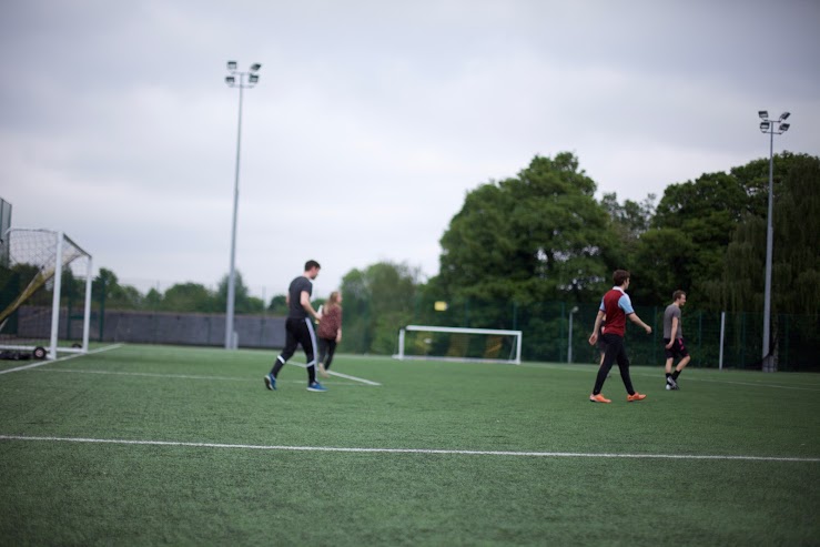 We meet with university students at the football pitch to build relationships for future gospel conversations.