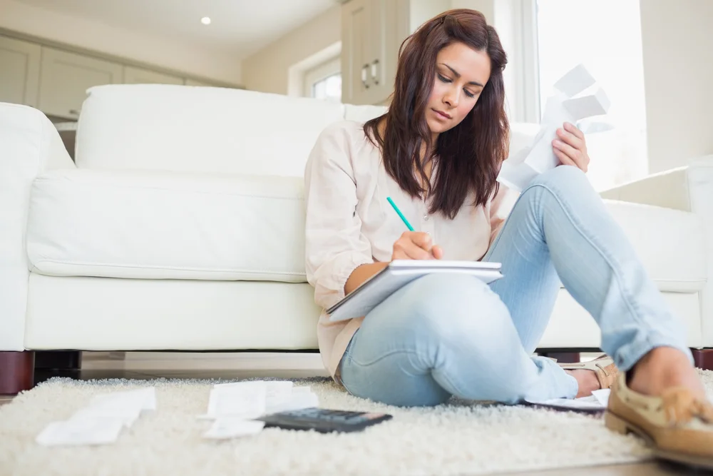 woman adding by couch.jpg