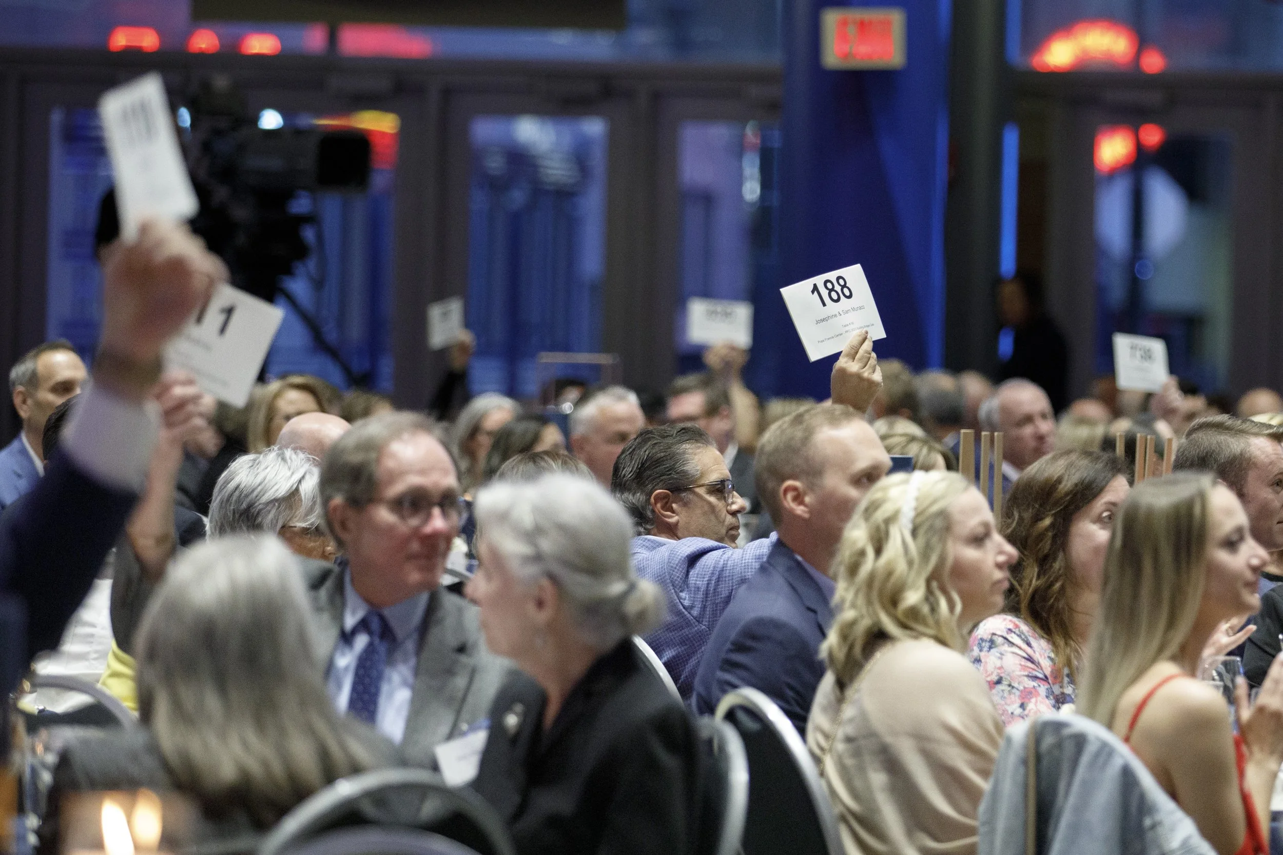  A collection of photography demonstrating Visual storytelling photography for the Detroit non profit The Pope Francis Center Building Bridges Gala in Detroit, Michigan 