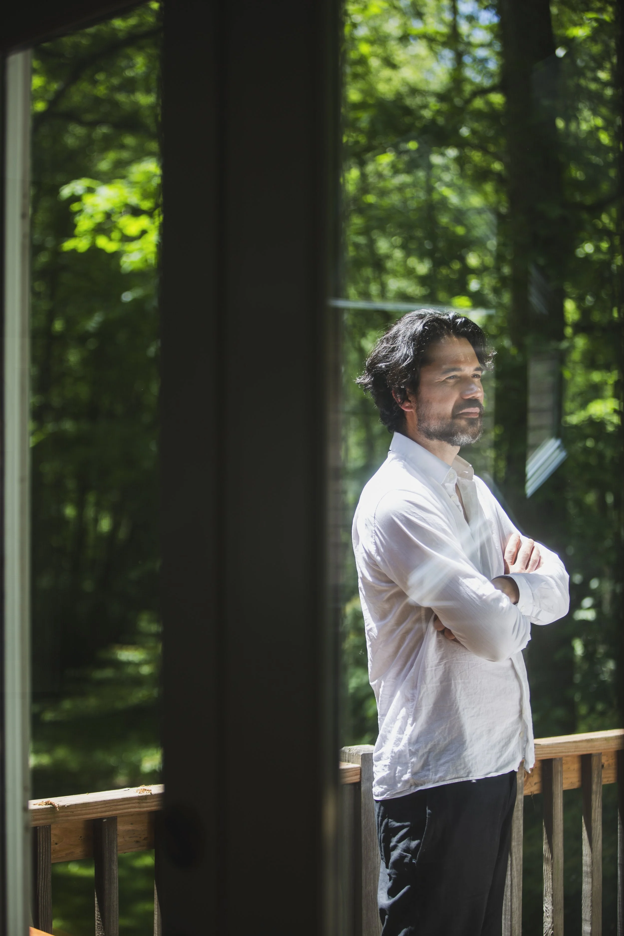 Documentary photograph of electronic musician Matthew Dear working in the recording studio during the creation of New Breed.