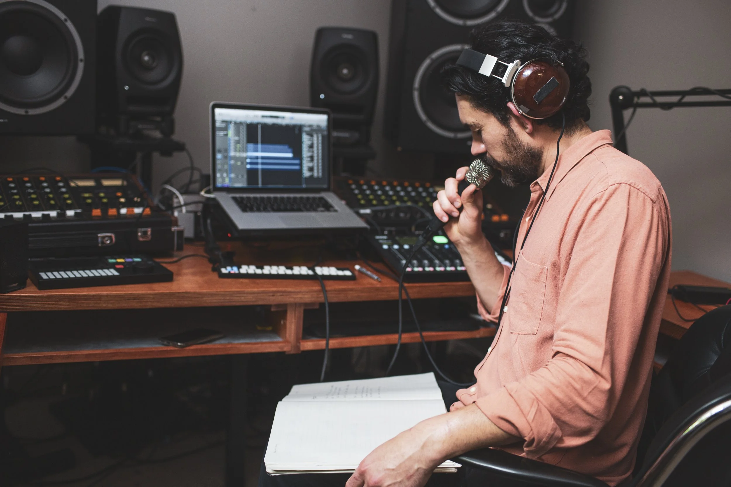 Documentary photograph of electronic musician Matthew Dear working in the recording studio during the creation of New Breed.