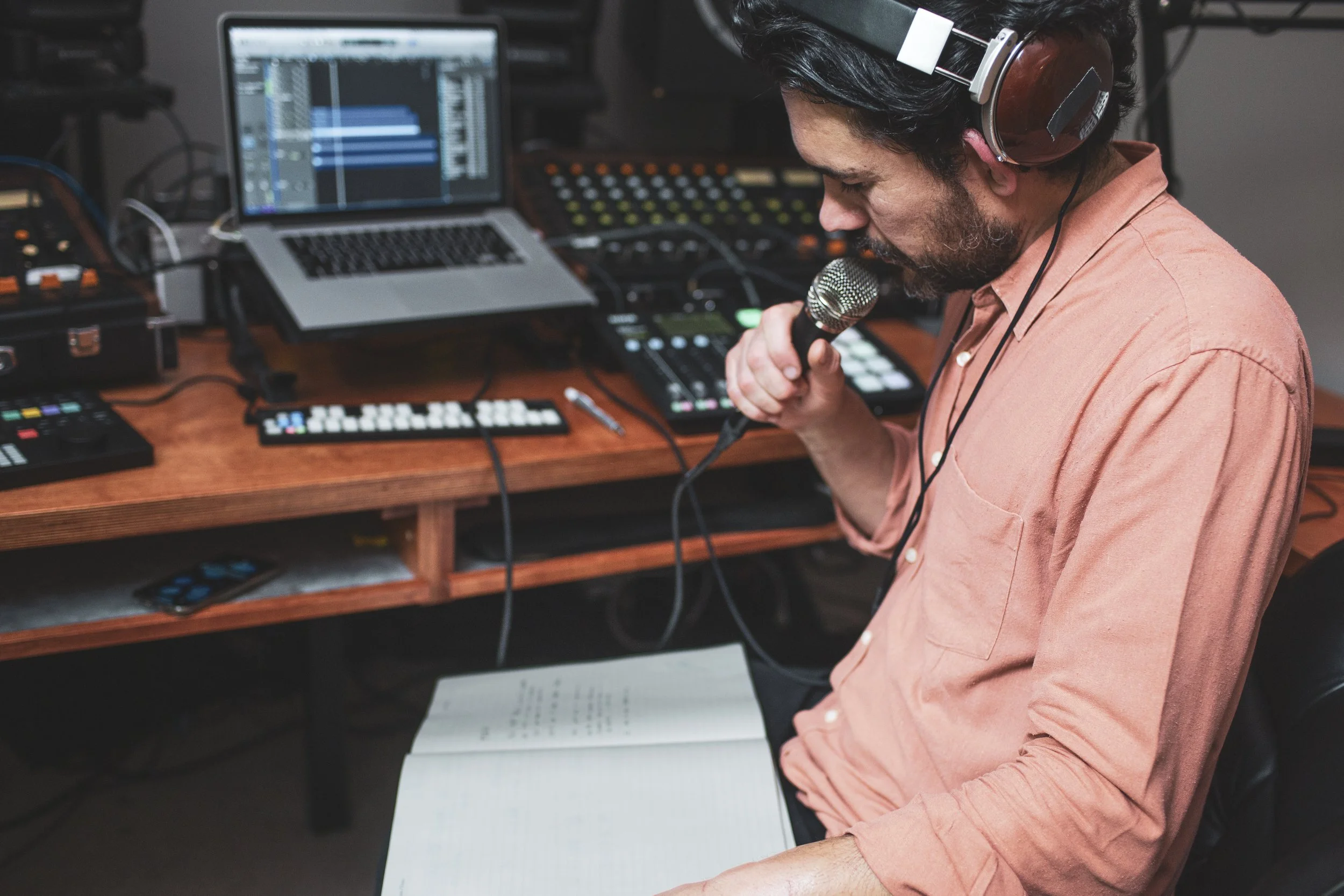 Documentary photograph of electronic musician Matthew Dear working in the recording studio during the creation of New Breed.